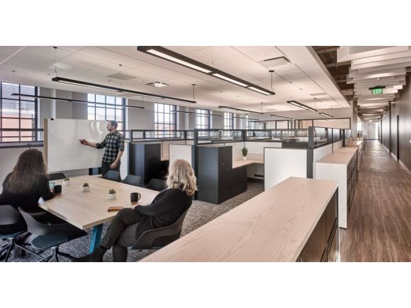 WHEDA offices showcase a modern industrial aesthetic with Rockfon ceiling systems